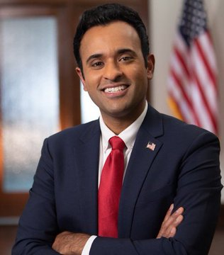 A professional portrait of Vivek Ramaswamy in a navy suit with a red tie and American flag pin, shown smiling with arms crossed in an official setting. The image accompanies news that his company Strive has purchased an additional 469 BTC valued at $36 million.