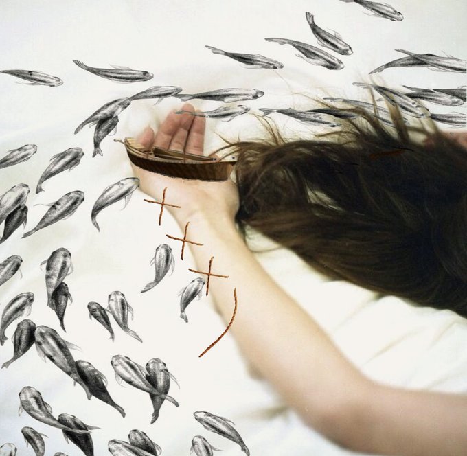 A surreal artwork depicting a woman lying down holding a small bowl, surrounded by falling black-and-white fish, with tally marks drawn on her arm.