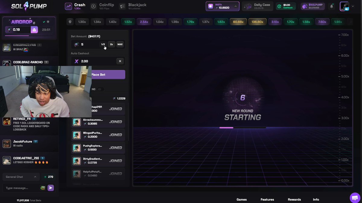 The image shows a computer screen displaying a video game interface with a purple background, featuring a player's profile and a game menu. The game appears to be a multiplayer game that involves crashing buildings or vehicles. A person wearing a headset can be seen in the top left corner of the screen, likely playing the game. The post includes an image of a person doing a 5 SOL bet on crash and walking away from it, which is related to the game being played.