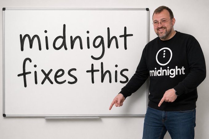 A man wearing a black sweatshirt with the 'midnight' logo stands next to a whiteboard that reads 'midnight fixes this', pointing at the text.