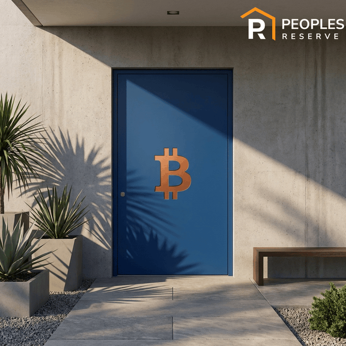 A blue door marked with a Bitcoin "₿" symbol stands at the entrance of a modern concrete home, visually representing the gap between holding crypto and owning property. The "Peoples Reserve" logo appears in the top right corner, reinforcing the brand's message about bridging the divide between Bitcoin holdings and homeownership.