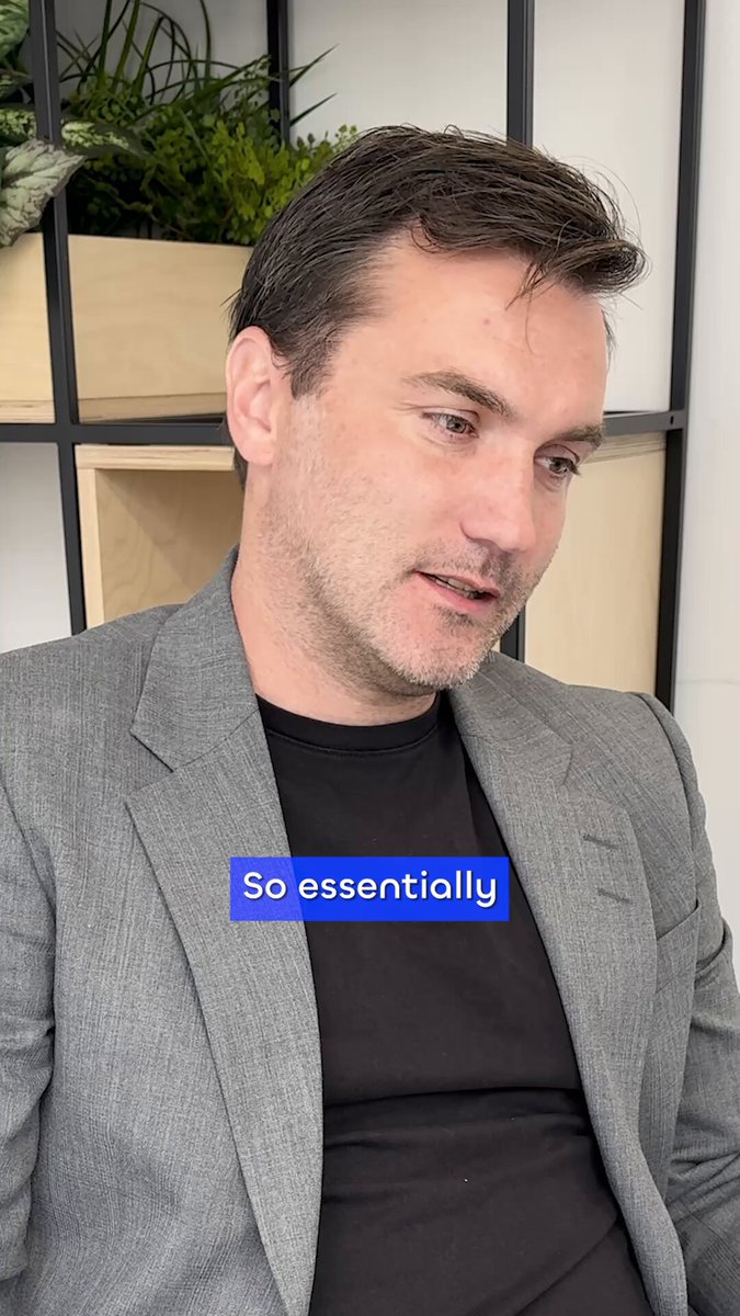 The image shows a man wearing a gray blazer, sitting down with his head tilted back as he looks off into the distance. The caption reads "You probably don't know who has access to your data. And you definitely don't control it. With AI blurring reality and data used as currency - what does 'trust' even mean anymore?".