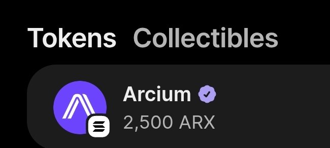 The image features a banner with text that reads "Tokens Collectibles" at the top, followed by an arrow pointing towards a purple circle containing a white "A" logo. Below this, there are two lines of text: one stating "Arcium" and another saying "2,500 ARX". The image also includes a small image of a coin in the bottom right corner.