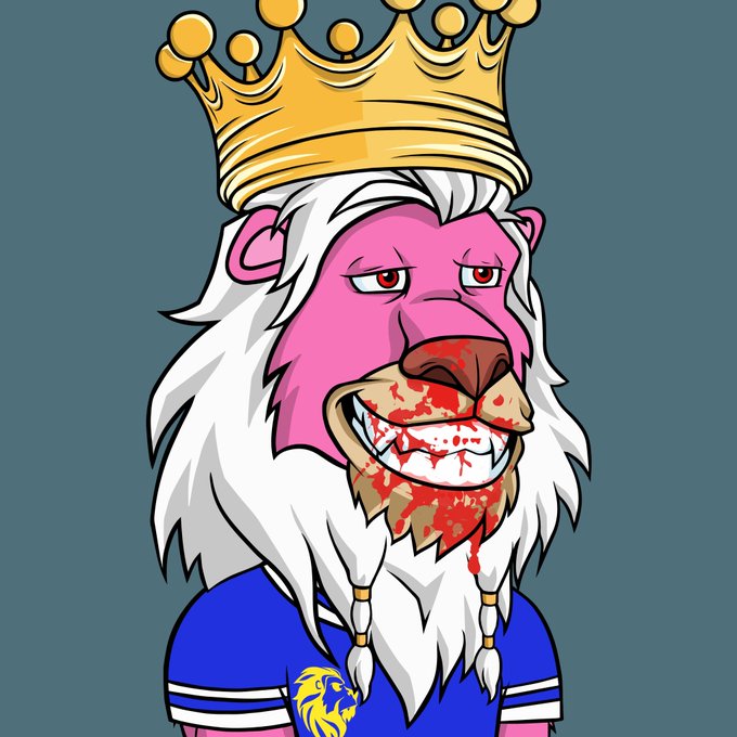A cartoon illustration of a pink-faced lion with a white mane, wearing a golden crown and a blue shirt, with red splatter resembling blood around its mouth.