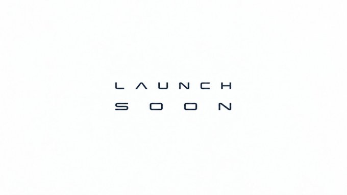 A minimalist white screen displaying the text 'LAUNCH SOON' in a stylized, futuristic font.