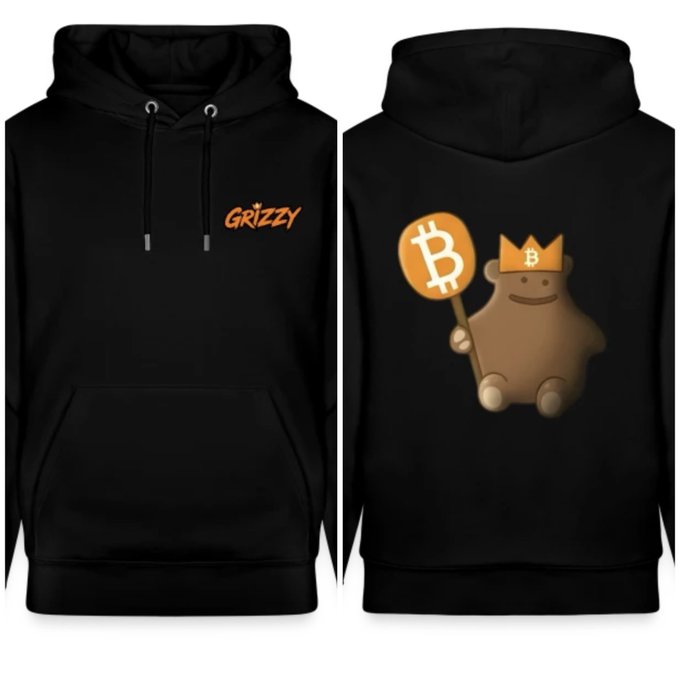 A black hoodie featuring "GRIZZY" text on the front chest and a graphic of a brown bear wearing a Bitcoin-themed crown while holding a Bitcoin sign on the back, promoting the new merchandise from the GRIZZY BTC shop.