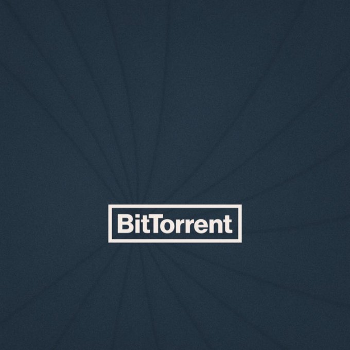 The image features the BitTorrent logo in a white rectangular frame against a textured dark navy blue background with radiating line patterns. The minimalist branding visually anchors the post's claim about BitTorrent as a pioneering example of decentralized infrastructure that predated Web3.