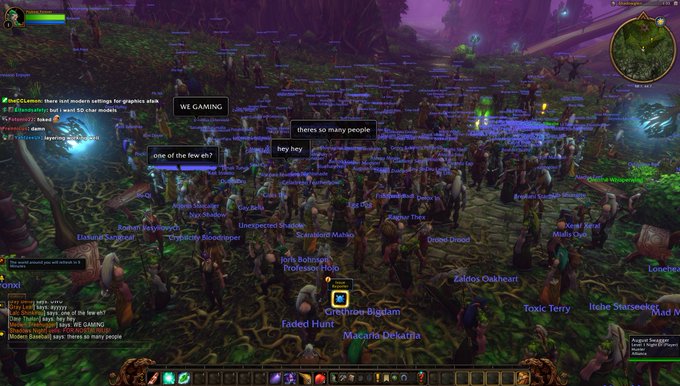 A World of Warcraft gameplay screenshot crowded with dozens of player characters and purple name tags, with chat messages like 'WE GAMING', 'theres so many people', and 'one of the few eh?'.