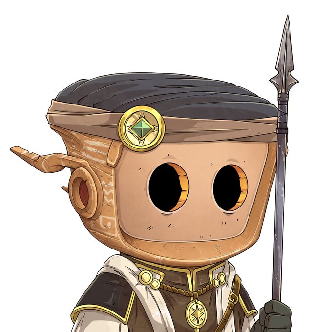 A chibi-style character with a wooden, mask-like face and dark head covering holds a tall spear, adorned with a golden emblem featuring a green gem and a medallion. The image aligns with the post as a reveal of a new character design by OriginalBlokyz, showcasing a stylized, fantasy-inspired figure.