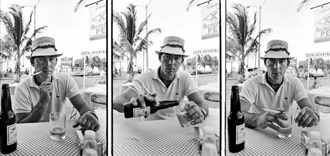 The image shows a man sitting at an outdoor table with three different shots of him pouring beer from a bottle into his glass. The first shot captures the man holding the beer bottle, while the second shot shows him pouring the beer into his glass. The third shot is a close-up view of the glass filled with beer. In the background, there are palm trees and other people enjoying their time at the beach or in the sun. This image seems to be related to a post about buying alcohol under the age of 20, as indicated by the caption "We really got another shot at buying รับนามียงสมิกทร".