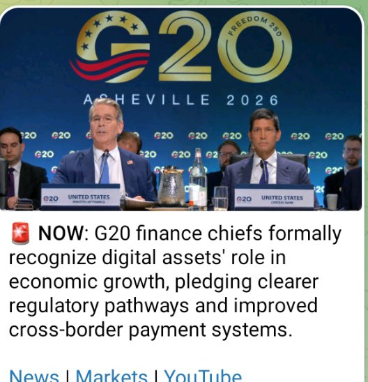 The image shows G20 finance officials seated at a panel in Asheville 2026, with the U.S. Treasury Secretary and a U.S. Central Bank representative labeled, beneath a G20 "Freedom 250" logo. The accompanying caption highlights that G20 finance chiefs formally recognized digital assets' role in economic growth, pledging clearer regulatory pathways and improved cross-border payment systems—aligning with the Chair's Statement on digital financial innovation.