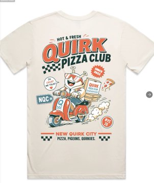 A cream-colored t-shirt featuring a vintage-style graphic for 'QUIRK PIZZA CLUB' in 'NEW QUIRK CITY,' depicting a cartoon character riding a red scooter with a pizza delivery box.