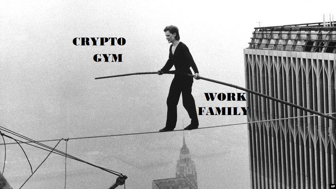 A black-and-white photo shows a man walking on a tightrope between skyscrapers while balancing a long pole, with bold text overlaid reading "CRYPTO GYM" and "WORK FAMILY."

The image metaphorically illustrates the post's message of precarious balance and perseverance, using the tightrope walker to represent navigating the unpredictable crypto market—having just been knocked out of the top 300 but determined to climb back.