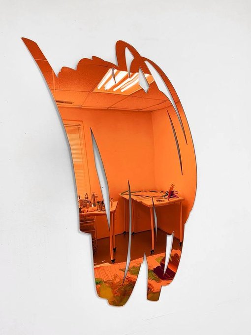A stylized artistic image with orange cut-out shapes revealing a scene of a room with a desk and shelves against a white background.