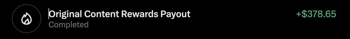 A dark notification screen indicating an 'Original Content Rewards Payout' that has 'Completed', showing an amount of '+$378.65' in green text.