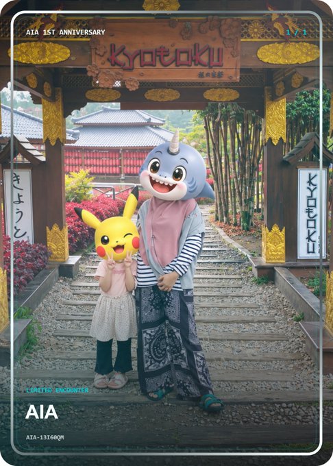An AI-generated anime-style image styled as a collectible card features a girl in a Pikachu mask holding hands with a character in a shark mask, standing on a Japanese temple path; text includes 'Kyotoku', 'AIA 1ST ANNIVERSARY', 'LIMITED ENCOUNTER', and 'AIA'.