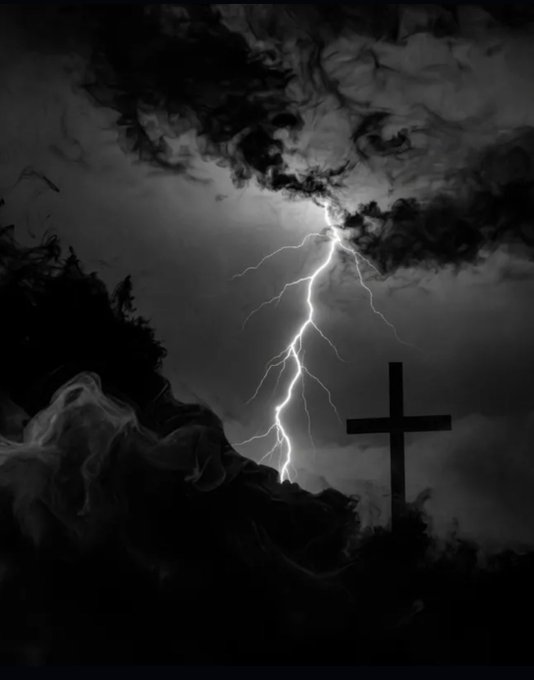 A dramatic black-and-white image of a Christian cross silhouetted against a stormy sky with a prominent lightning bolt striking down.