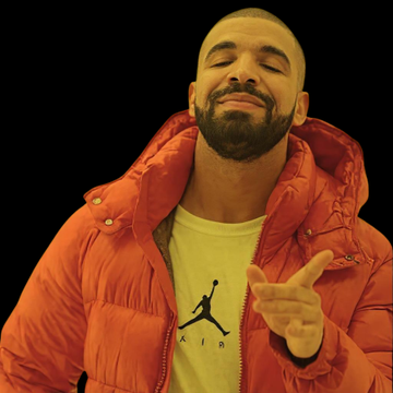 A man with a beard wearing an orange puffer jacket over a white Jordan t-shirt smiles with closed eyes and points forward, resembling rapper Drake. The image relates to the post about Drake losing a $1.5 million USDT bet after Argentina defeated Spain in the World Cup final.
