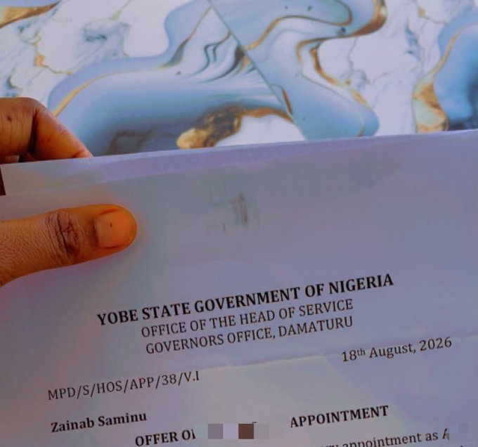 A hand holds an official appointment letter from the Yobe State Government of Nigeria, dated 18th August 2026, addressed to Zainab Saminu, which supports the post's message about the importance of having verifiable, legitimate government-recognized credentials rather than relying solely on crypto earnings for recognition as a citizen.
