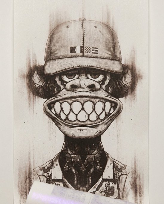 The image features a cartoon drawing of an anthropomorphized monkey wearing a hat, with its mouth open wide as if speaking or laughing. The monkey appears to be smiling, giving off a friendly vibe. The background of the image is white, which contrasts nicely with the black and white color scheme of the drawing. There are also some words written in the bottom right corner of the image that read "GET MONEY. STACK IT. STAY BLESSED." This message seems to be related to the post about the "Yacht Club" on social media, as indicated by the text.