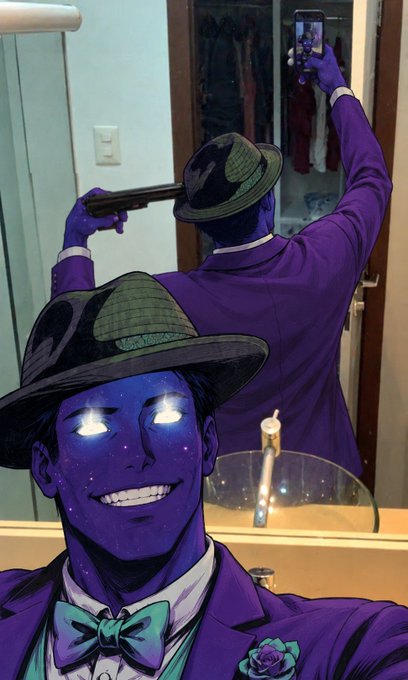 A person cosplaying as a purple-skinned character with glowing eyes, wearing a fedora and a purple suit, takes a mirror selfie with a gun while adjusting their hat.