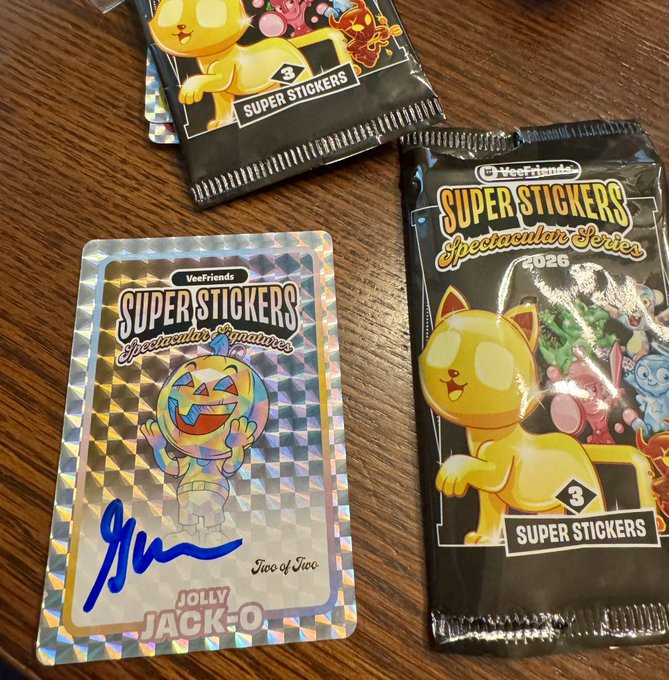Two packs of VeeFriends 'Super Stickers Spectacular Series 2026' booster packs with a holographic 'Jolly Jack-O' signature card signed by 'Two of Two'.