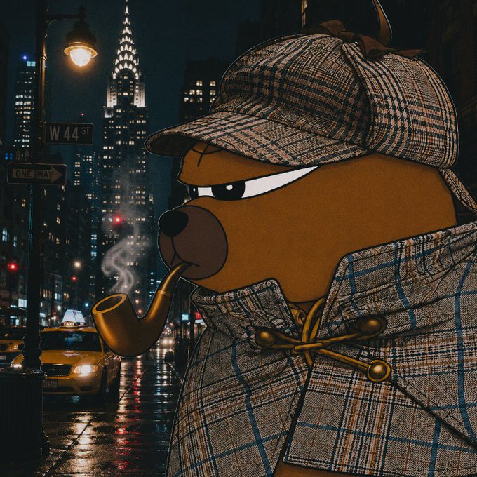 An illustrated brown bear character dressed as a detective in a plaid trench coat and deerstalker hat, smoking a pipe, with the Chrysler Building and "W 44 ST" street sign visible in the nighttime New York background.