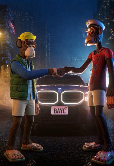 Two Bored Ape-style NFT characters fist bump in front of a BMW with a "BAYC" license plate on a city street at night.