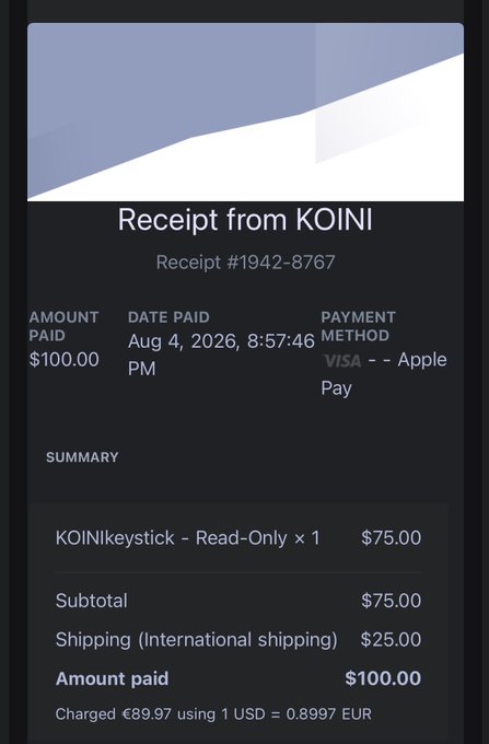 A digital receipt from 'KOINI' for a 'KOINIkeystick - Read-Only' purchase of $75.00 plus $25.00 international shipping, totaling $100.00 paid via Visa/Apple Pay on Aug 4, 2026.