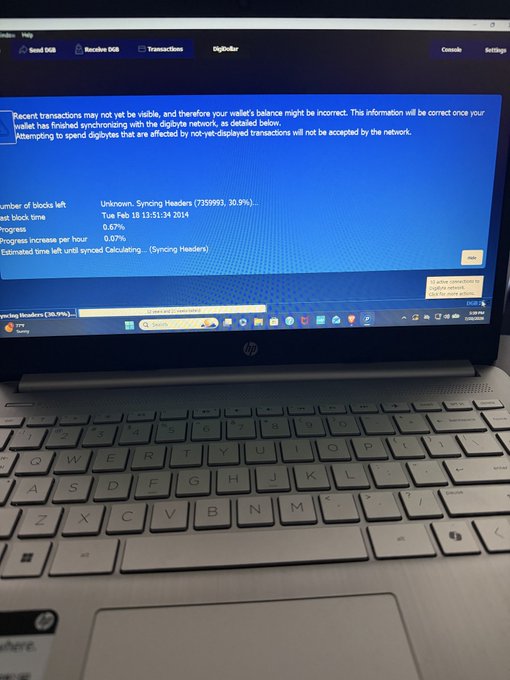 An HP laptop displaying the DigiByte wallet synchronization screen showing 'Syncing Headers (7359993, 30.9%)' with a sync date of Tue Feb 18 11:51:34 2014.