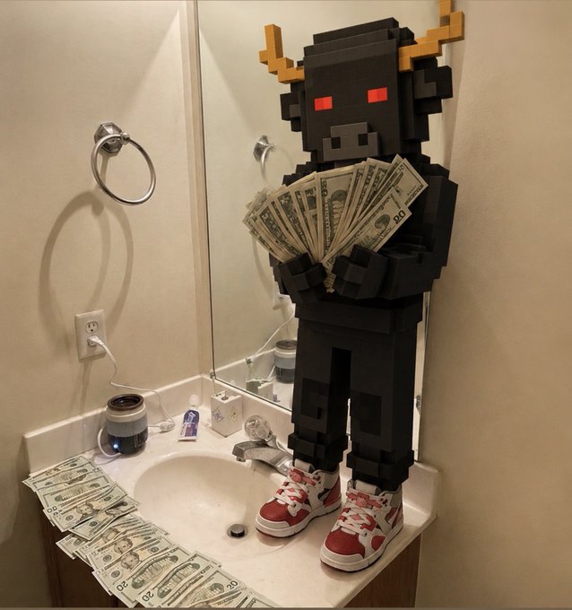 A black blocky figure with red eyes and orange horns stands on a bathroom sink wearing red and white sneakers, holding a fan of twenty-dollar bills with more cash scattered on the counter.