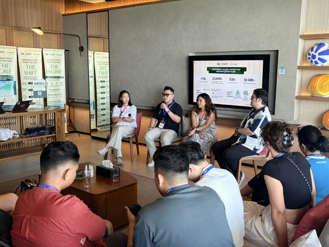 A panel discussion at CoinfestAsia's Day 1 Indonesia GTM Session, featuring speakers seated on stage in front of a screen displaying "Indonesia's crypto market" statistics of 22.69M traders and $31B+ in value, with James Eugene (Vice President of Business Development) addressing the audience.