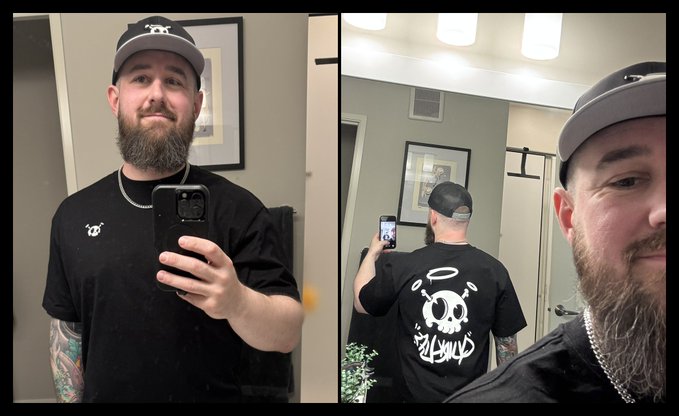 A bearded man wearing a black "Quirkies" branded t-shirt and matching cap poses for mirror selfies in what appears to be a public restroom, showcasing both the front and back of the shirt which features a skull design with the "Quirkies" logo. The images highlight the merch he's proudly wearing, supporting the post about getting his hands on Quirkies NFT-branded apparel despite not yet owning the NFT itself.