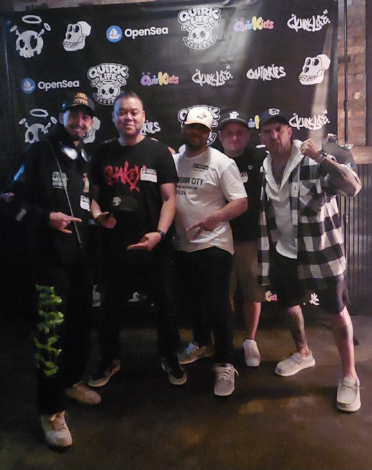 Five individuals pose together at a "Quirkies" and "OpenSea" branded networking event backdrop, with one wearing a "Chunk City" shirt, reflecting the post's celebration of a great Web 3 networking event with their NFT and crypto community friends.
