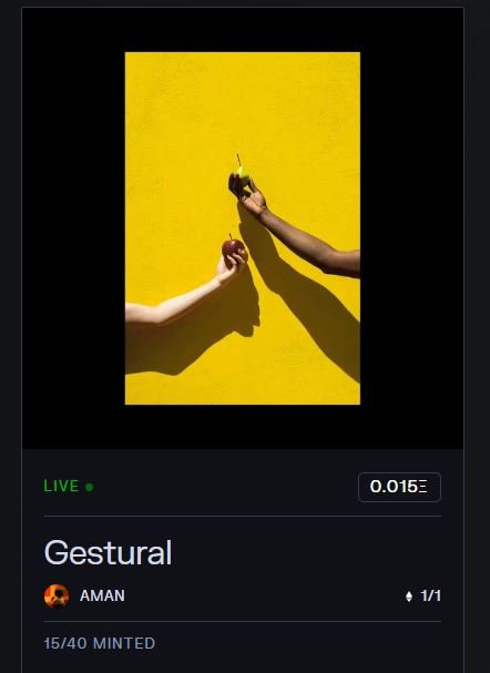 A digital display shows an NFT artwork titled 'Gestural' by AMAN, featuring arms against a yellow background, priced at 0.015 ETH with 15/40 minted.