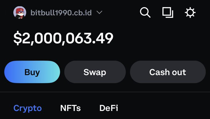 A cryptocurrency wallet interface for user 'bitbull1990.cb.id' displaying a balance of '$2,000,063.49' with options to 'Buy', 'Swap', and 'Cash out', along with tabs for Crypto, NFTs, and DeFi.