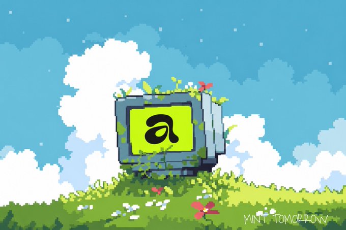 Pixel art illustration showing a computer monitor with a green 'a' logo covered in vines and flowers against a blue sky with clouds, signed 'MINI_TOMORROW'.