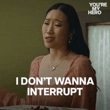 The image features a woman with long dark hair wearing a pink dress, who appears to be upset or crying. The caption below her reads "I don't want to interrupt", which suggests that she wants to continue whatever she's doing without being interrupted at this moment.