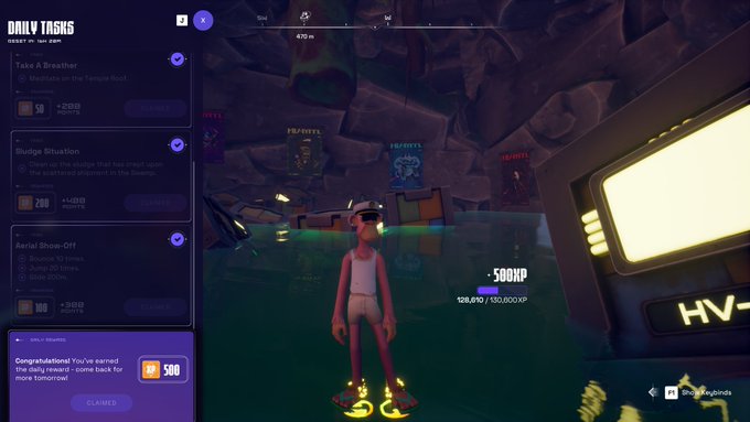 The image shows a video game screen with a character standing in front of a TV, wearing virtual reality goggles. The character appears to be playing a game that involves navigating through various rooms or levels within a cave-like environment. The player's goal is to reach the top level and complete all the challenges before time runs out.