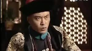The image features a man wearing an old-fashioned outfit, including a hat with a feather, which suggests that he might be from a historical period or participating in a themed event. The man appears to be looking down at something, possibly contemplating his next move or observing his surroundings. The surrounding environment includes a potted plant and a window, adding to the atmosphere of the scene.

The post about the man's outfit is accompanied by an image of him wearing the costume, which further emphasizes the historical context of the scene. Additionally, there are some numbers in the image that could be related to the event or the man's performance.