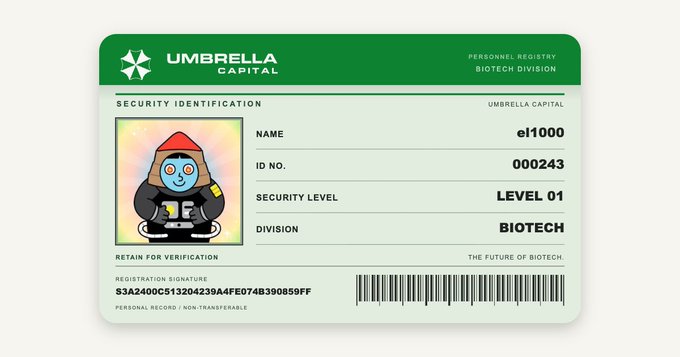 A security identification card for 'Umbrella Capital' Personnel Registry Biotech Division, featuring a cartoon gnome character in a hoodie, with name 'el1000', ID '000243', and Security Level 01.