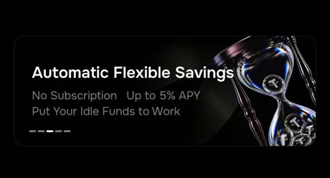 The image is a dark promotional banner for AlphaX Flexible Savings, featuring a chrome hourglass with cryptocurrency coins on the right and text on the left reading: "Automatic Flexible Savings," "No Subscription," "Up to 5% APY," and "Put Your Idle Funds to Work." The hourglass visually reinforces the post's message about effortless, set-and-forget savings growth, illustrating how idle crypto funds can earn up to 5% APY automatically without subscriptions or lock-up periods.