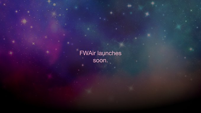 A promotional teaser image with a cosmic nebula background reading 'FWAir launches soon.'