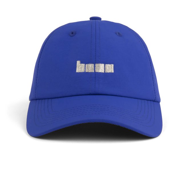 A royal blue dad hat features white embroidered text reading "hun" on the front, shown against a plain background.
