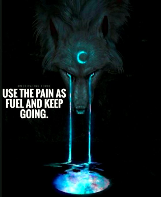 A dark, stylized image of a wolf's head with glowing blue tears forming streams that pool into a glowing puddle below, with the text 'USE THE PAIN AS FUEL AND KEEP GOING.'