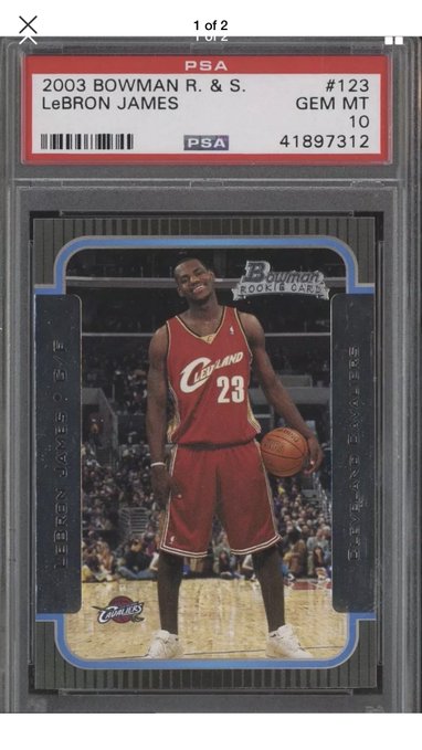 A PSA-graded 2003 Bowman Rookie & Stars LeBron James basketball card (#123, GEM MT 10) featuring him in a Cleveland Cavaliers #23 jersey. The image shows the owner displaying their prized sports trading card, clarifying it's a sports collectible rather than a trading card game like Pokémon or Magic: The Gathering.