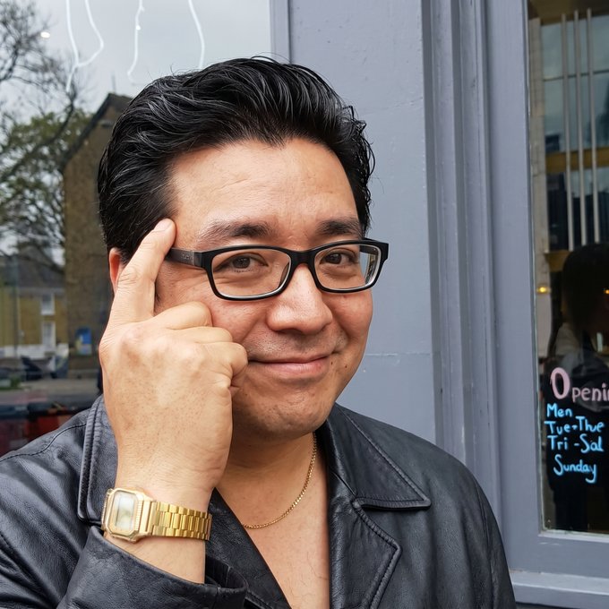 The image features a man wearing glasses, a leather jacket, and a gold watch. He has his hand up to his head with an expression of thought or contemplation. The caption "It' s time to pivot from leveraged sound money to yield-bearing ultrasound money..." suggests that there is a shift in the financial landscape, possibly related to the current economic climate.

The man's attire and accessories convey a sense of sophistication and style, which could be associated with the emerging trend of investing in alternative assets like real estate or private equity funds rather than traditional bonds or stocks. The gold watch he wears might symbolize his interest in these new investment opportunities that offer higher returns but also come with increased risk.