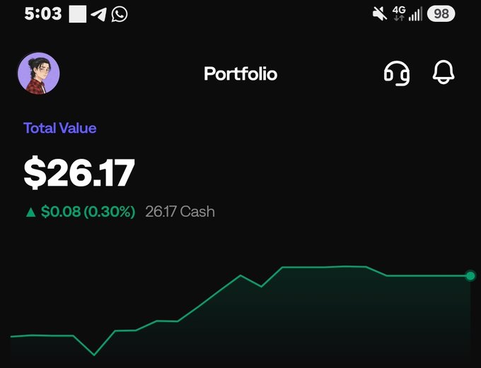 Mobile app portfolio screen showing a total value of '$26.17' with a 0.30% gain, 26.17 Cash balance, and a green performance line chart.