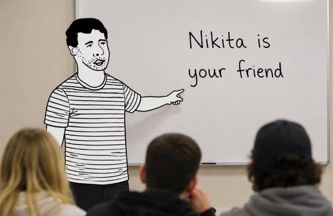 An illustration of a man in a striped shirt pointing at a whiteboard that reads 'Nikita is your friend' in front of an audience.