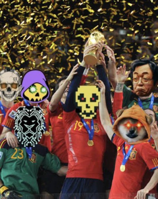 A Spanish soccer team celebrating with the FIFA World Cup trophy, with faces of players and mascots edited to show various crypto/meme characters including a skull, pixel art face, and the Dogecoin dog in a hoodie.